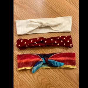 Three cloth headbands.